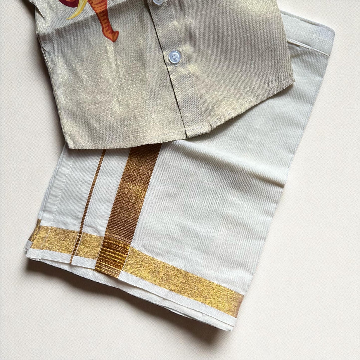 Gold tissue shirt and Mundu Set