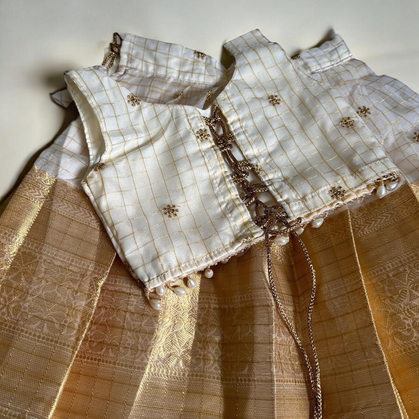 Checkered Gold Kasavu Pattupavada with Pearl Trim