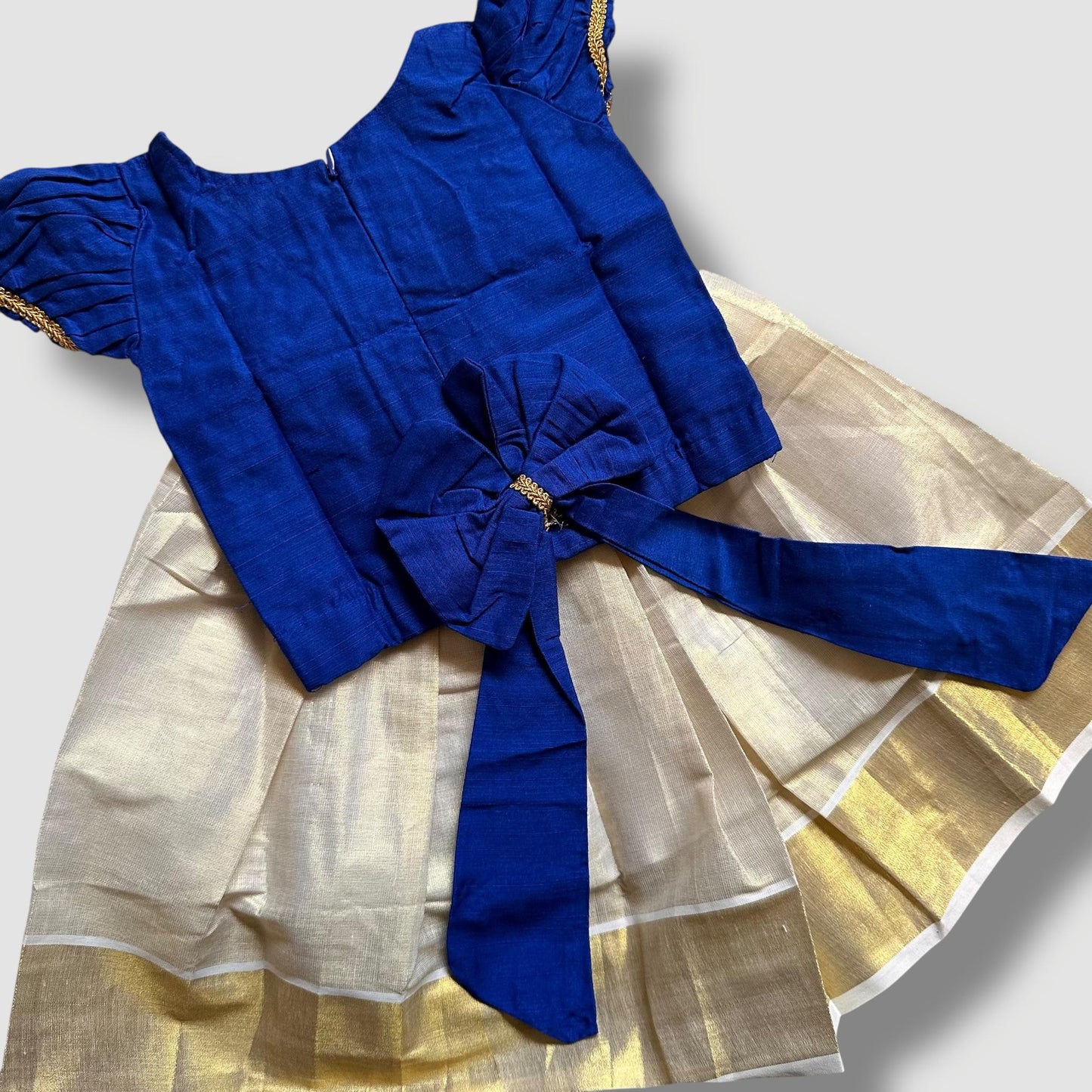 Royal Blue Beaded Blouse with Cream Kasavu Skirt