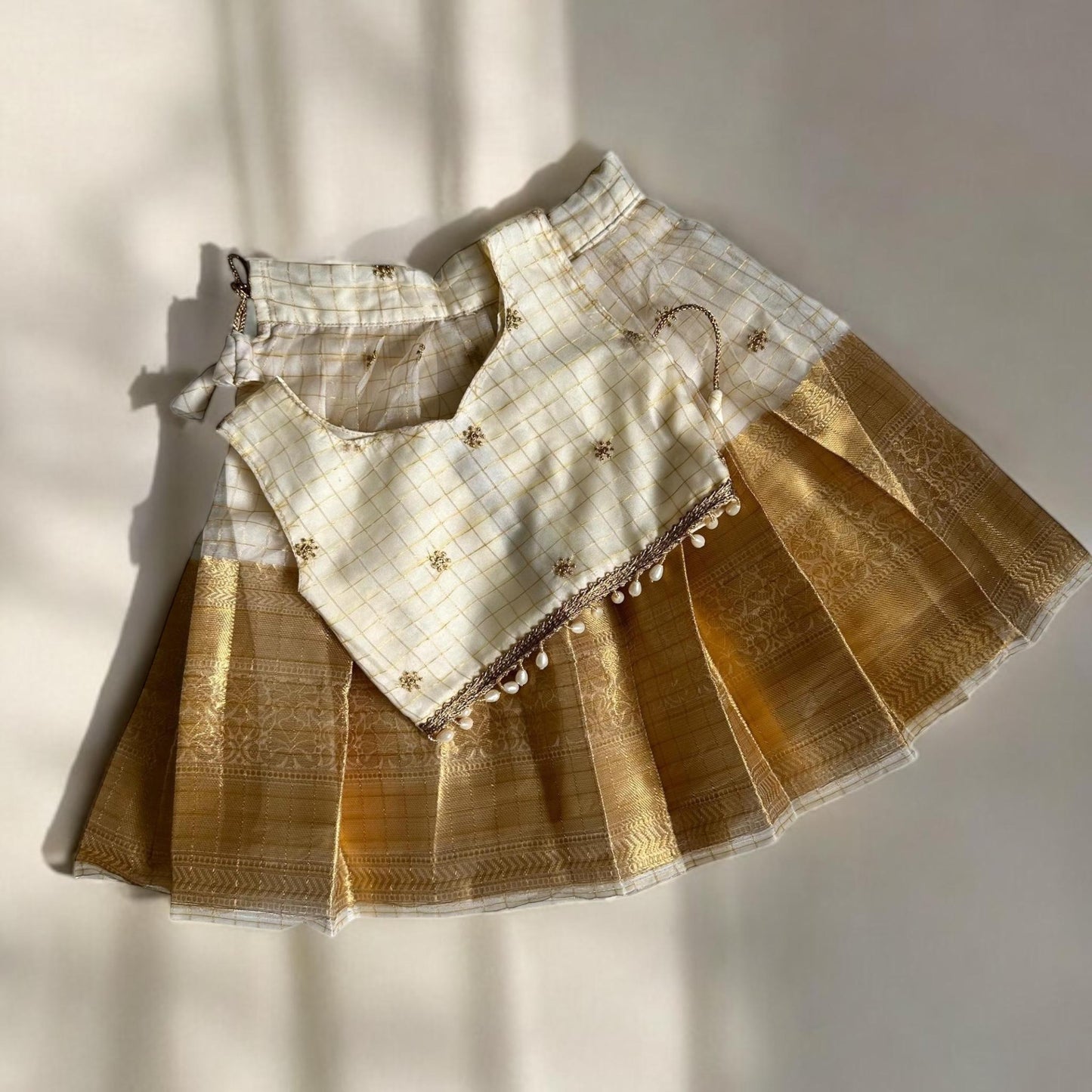 Checkered Gold Kasavu Pattupavada with Pearl Trim