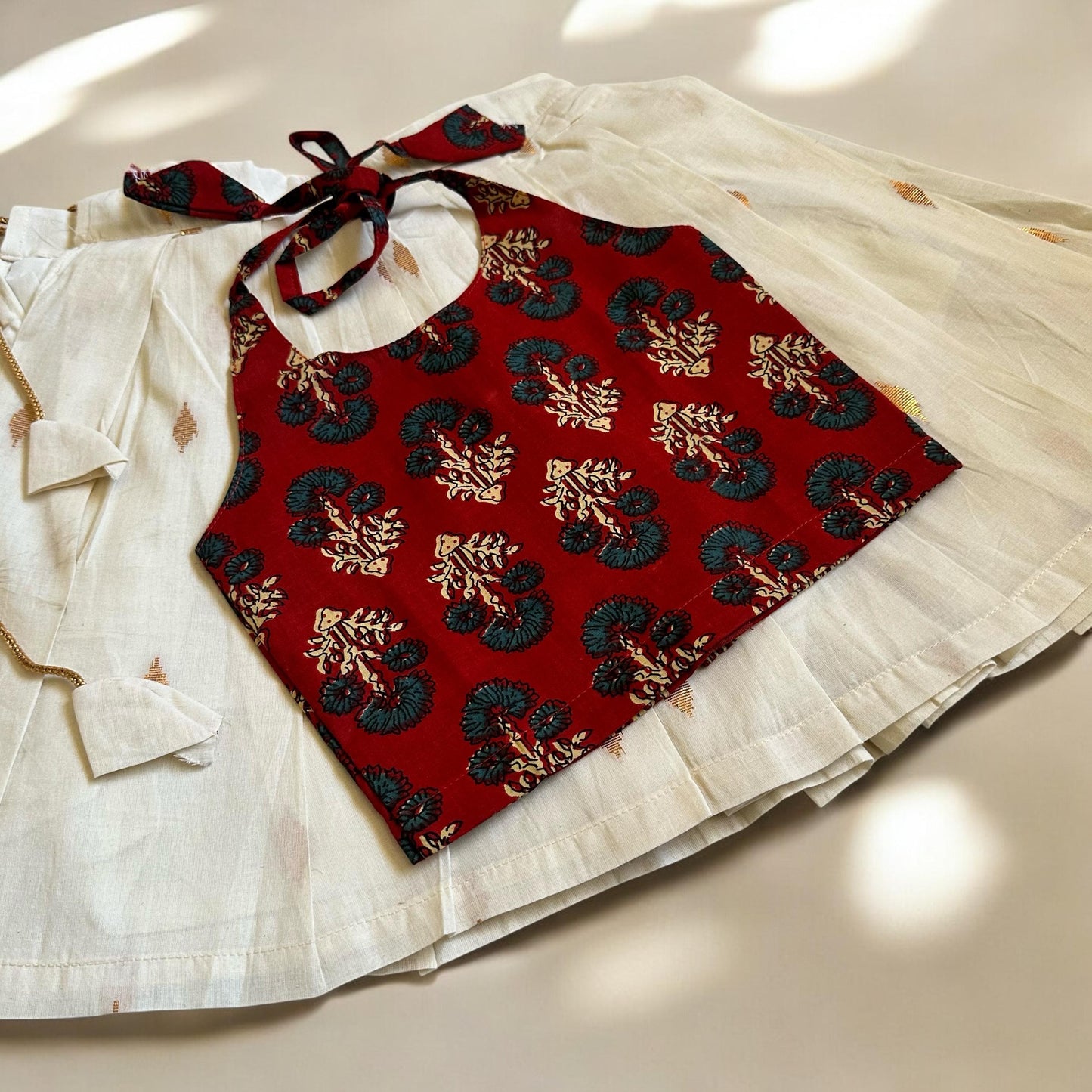 Ajrakh Print Tie-Up Top & Cream Kasavu Skirt Set