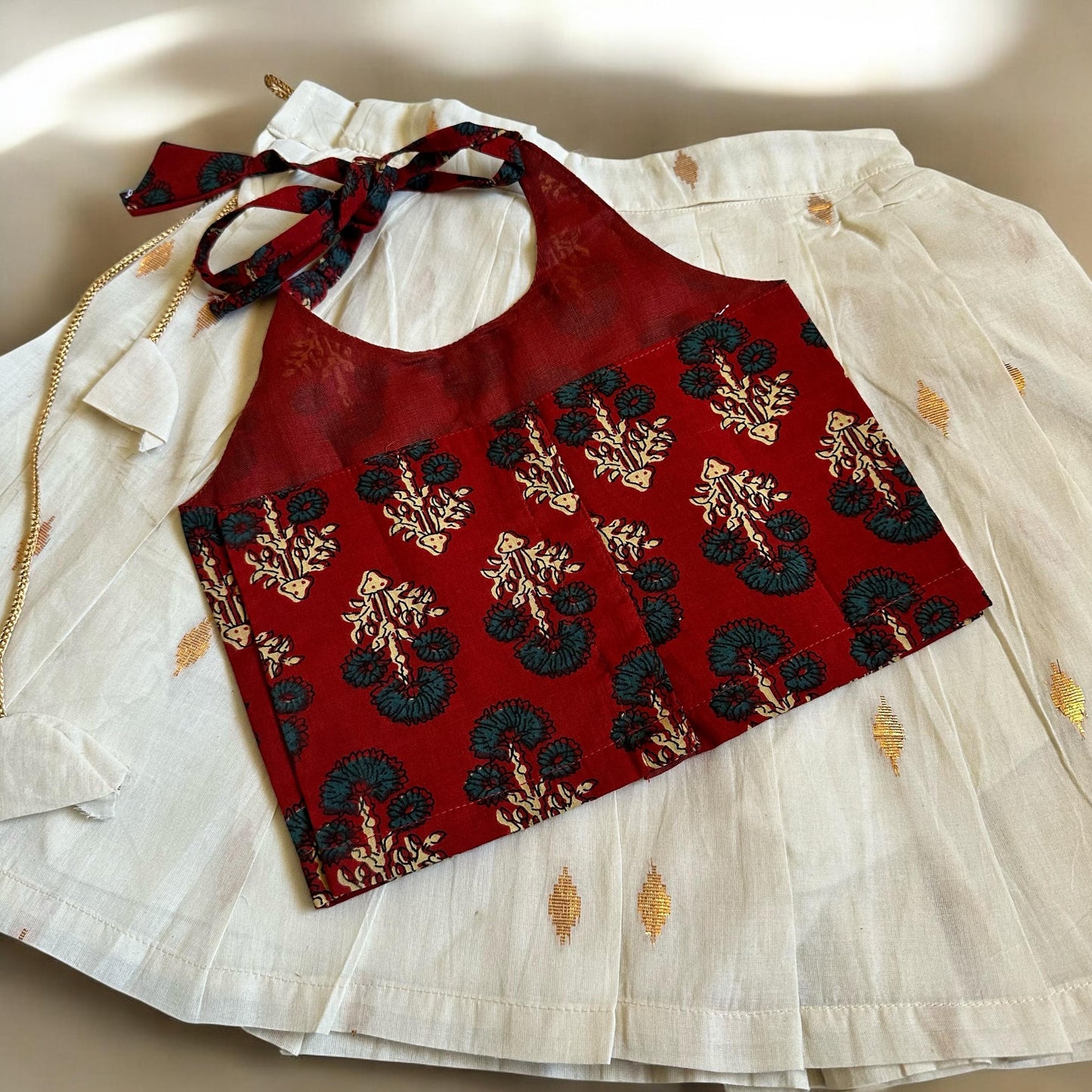 Ajrakh Print Tie-Up Top & Cream Kasavu Skirt Set