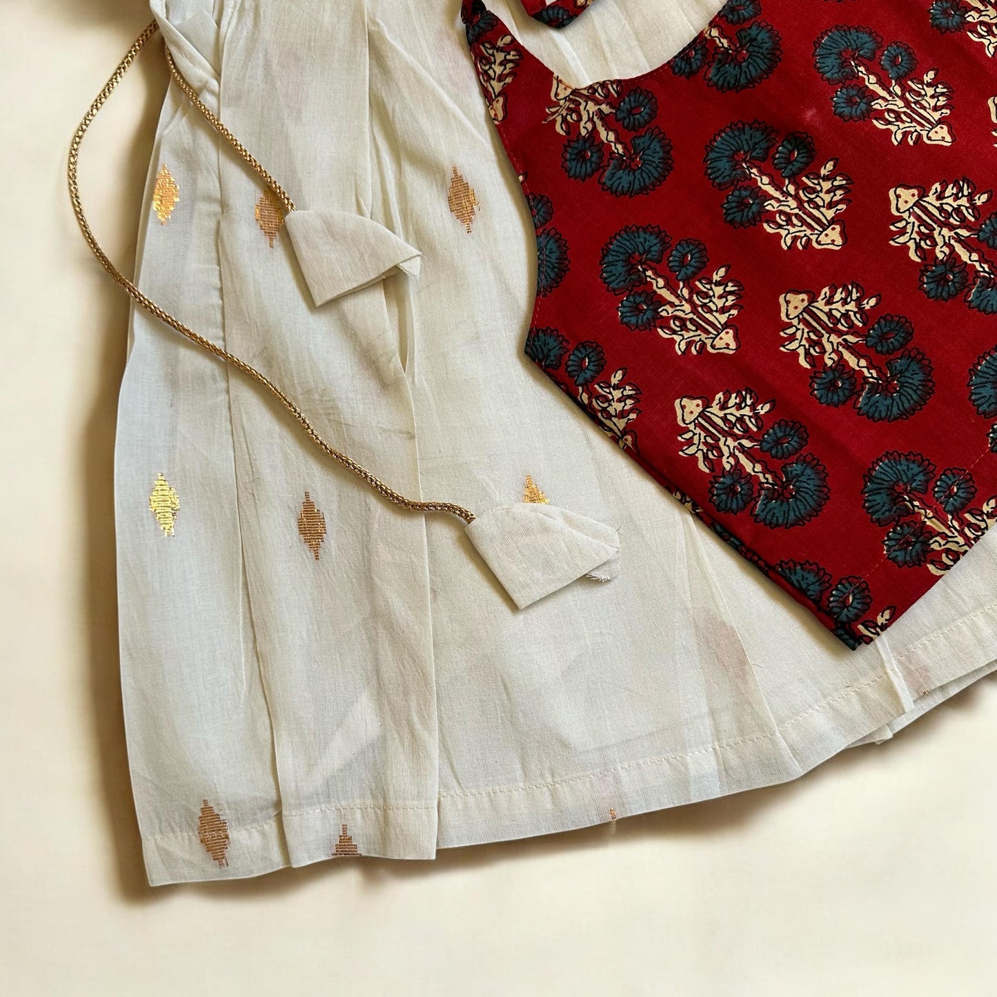 Ajrakh Print Tie-Up Top & Cream Kasavu Skirt Set