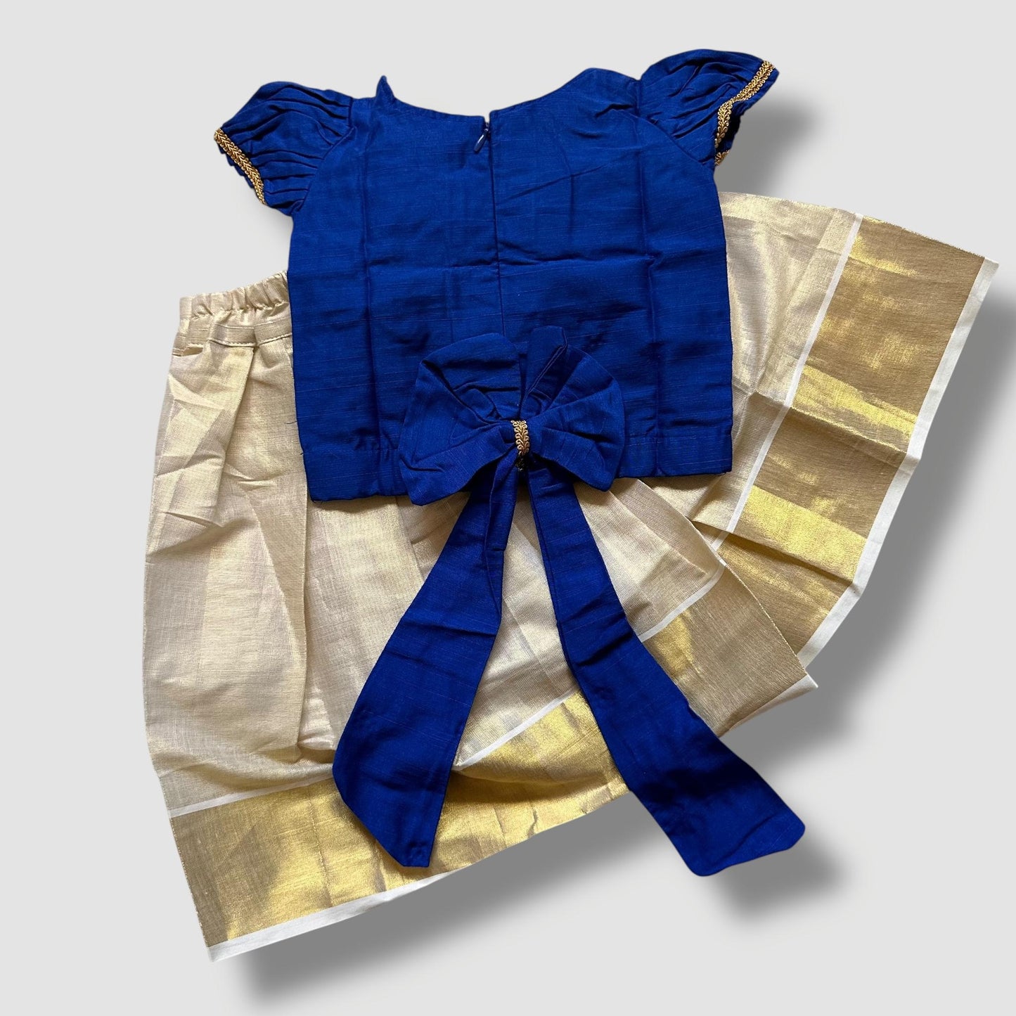Royal Blue Beaded Blouse with Cream Kasavu Skirt